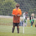 Calvin plays in Soccer Mudfest